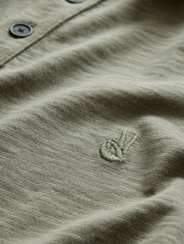 VICTOR SS SLUB CTN POLO W PEACE SIGN EMB